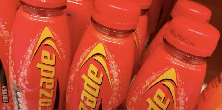 Several Lucozade bottles in original packaging.