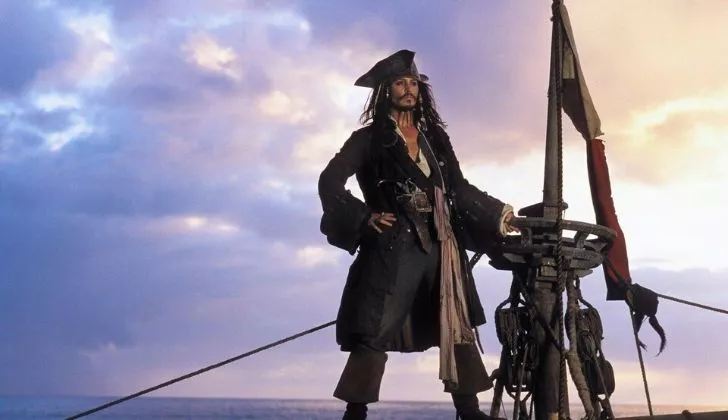 Captain Jack Sparrow with clouds behind him.