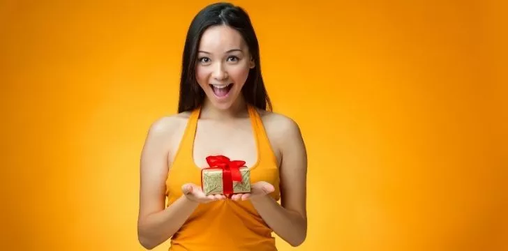 A Chinese woman happy to receive a gift