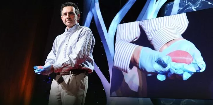 A man holding the very first 3D printed organ.