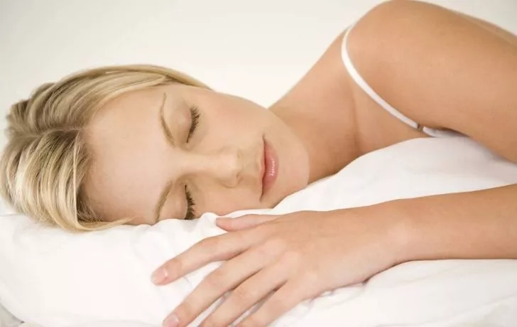 A woman with great complexion sleeping