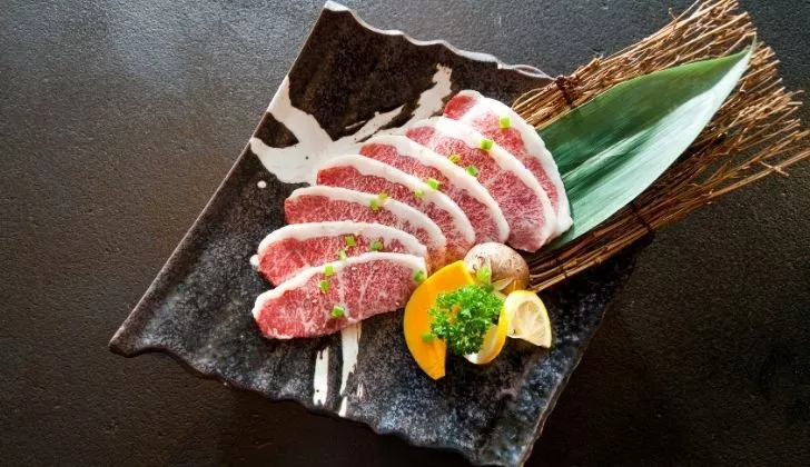 A plate of raw wagyu beef steaks