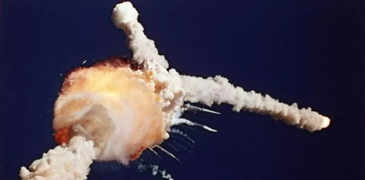 Image shows the Space Shuttle Challenger exploding