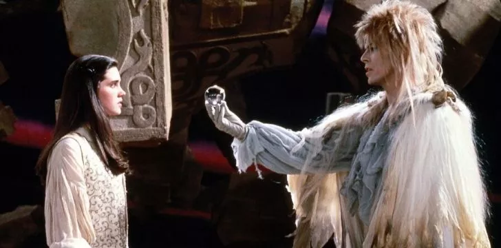 David Bowie in The Labyrinth holding a contact juggling ball.