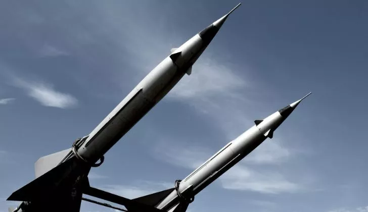 A picture of two nuclear missiles.