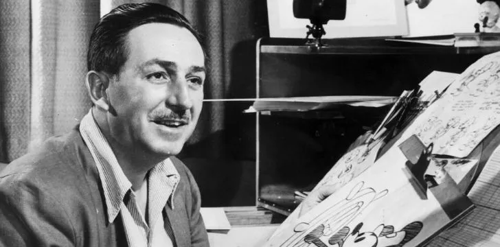 A black and white picture of Walt Disney.