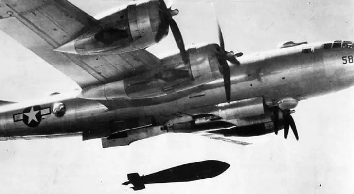 A bomber plane dropping a bomb