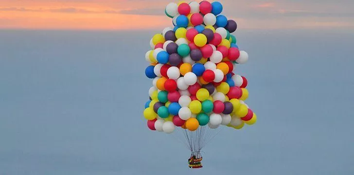 How many balloons would it take to float?