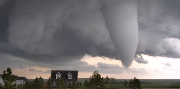 A tornado next to a country house in Colorado