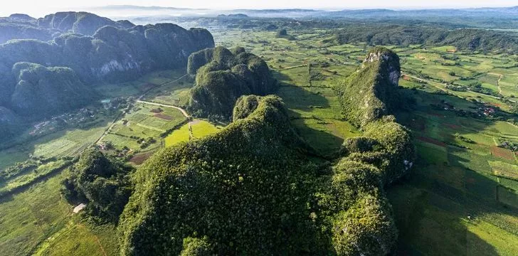 Cuban green landscape showing mountain's and forest.