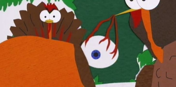 Kenny's blue eye being held by a turkey.
