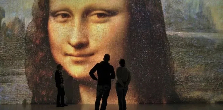 Mona Lisa art work covering an entire wall is not the real picture