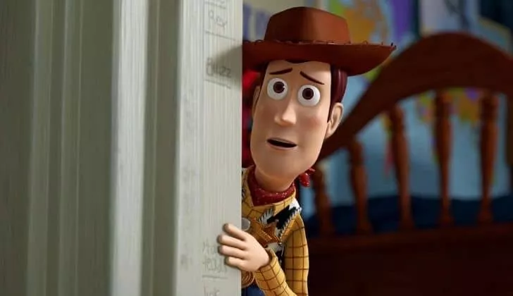 Woody wearing around a door frame