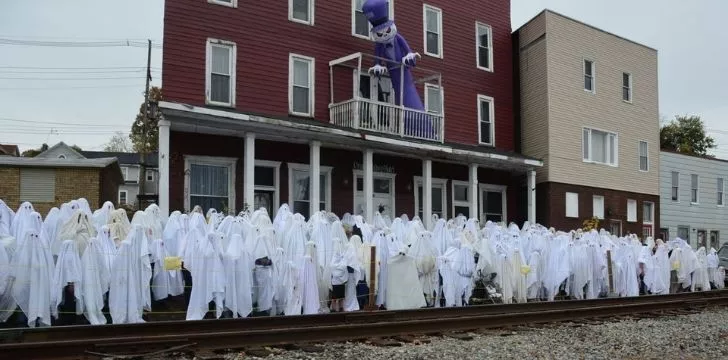 Dressed up ghosts outside of The Grand Midway Hotel