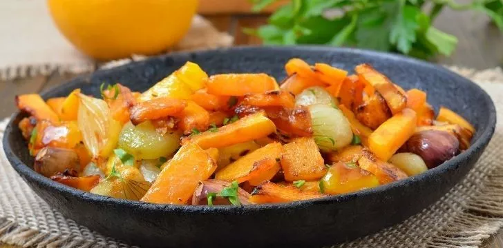 A bowl of colorful pumpkin stew