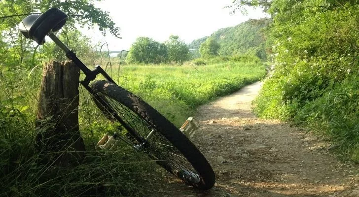 A unicycle on a countryside trail