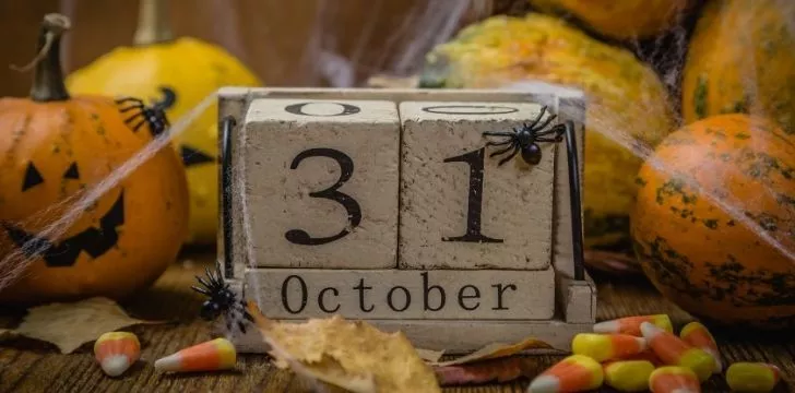 A picture of date blocks for 31 October covered in webs