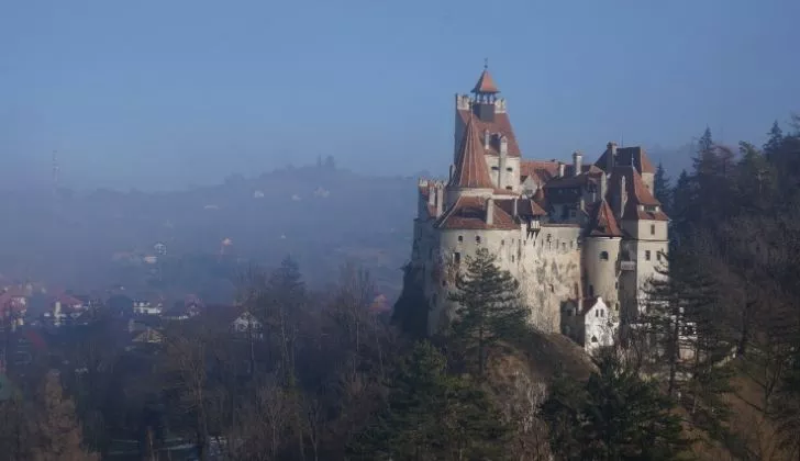 Dracula castle surrounded with fogs