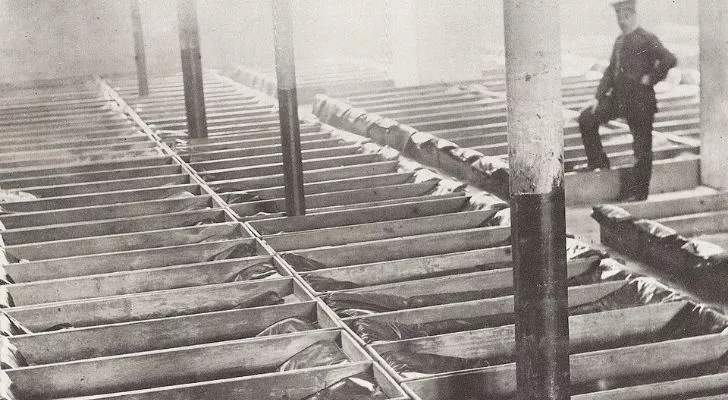 Rows of coffin-shaped box beds which were known as four penny beds