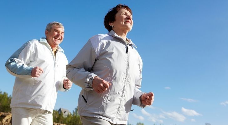A mature couple enjoying a run together