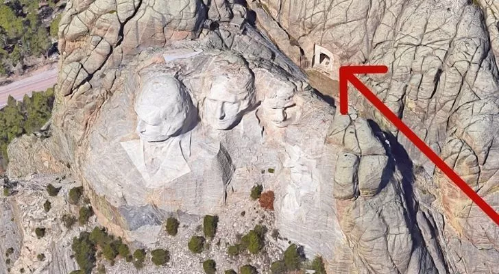 An arrow pointing to a secret room at the top of Mount Rushmore