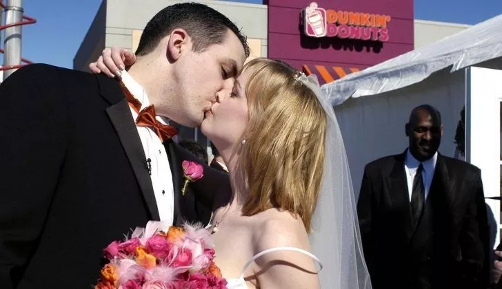 A couple getting married at Dunkin Donuts