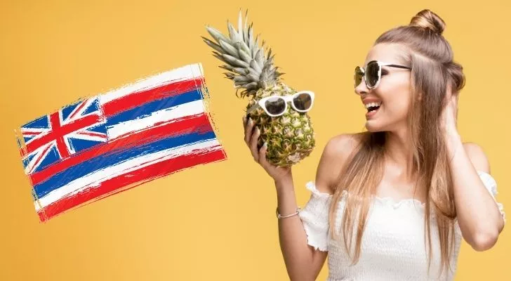 A woman and pineapple both wearing sunglasses with a Hawaiian flag in the background