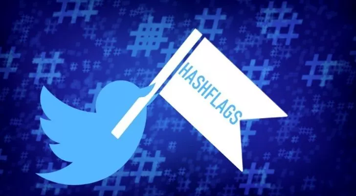 The Twitter bird holding a flag that reads "Hashflags"