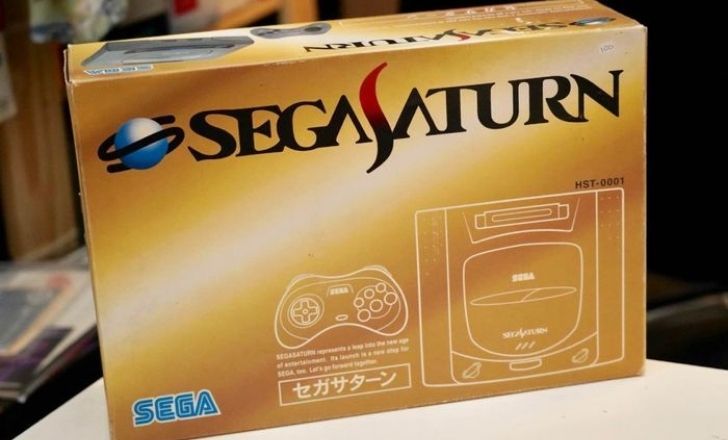 The original Japanese Sega Saturn in a golden box