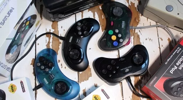 Lots of different colored Sega Saturn controllers