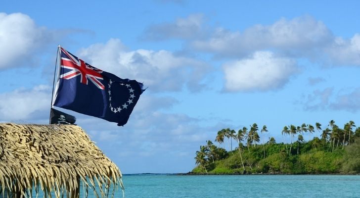 Cook Islands flag blowing in the gentle sea breeze