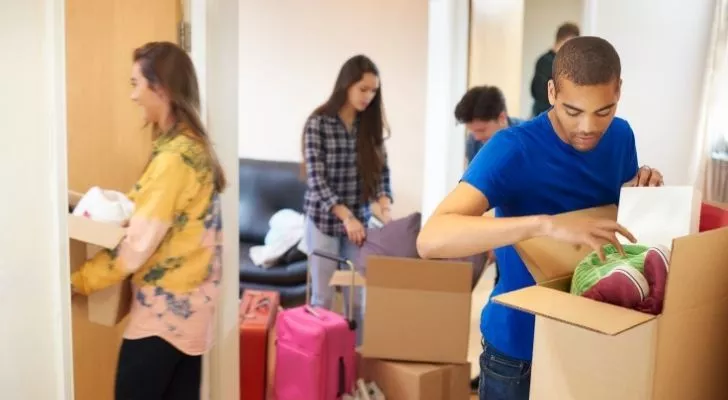 Students packing their belongings