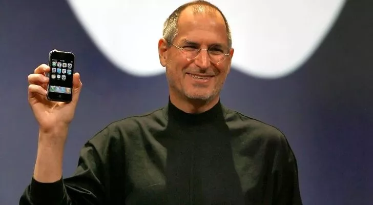 Steve Jobs presenting an iPhone
