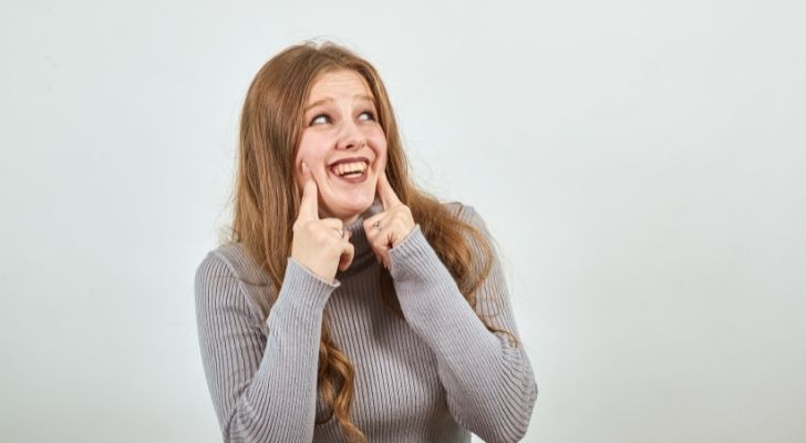 A woman fake laughing