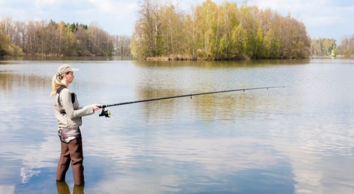 A woman fishing, but not on Sunday