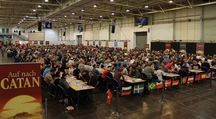 People playing the biggest game ever of Settlers of Catan