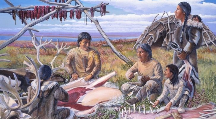 Paleo Indians skinning animals