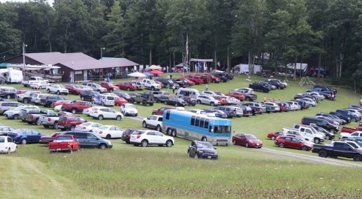Many vehicles parked up for the Lilly Family Reunion