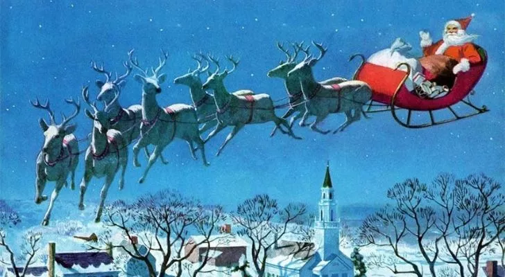Santa flying over a small top on Christmas Eve