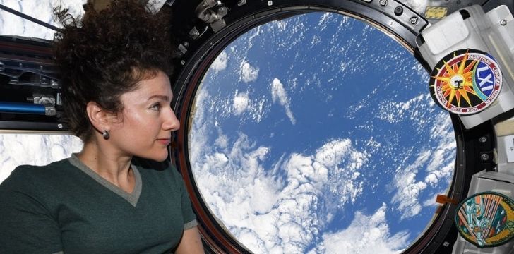 Astronaut Jessica Meir looking at Earth from space