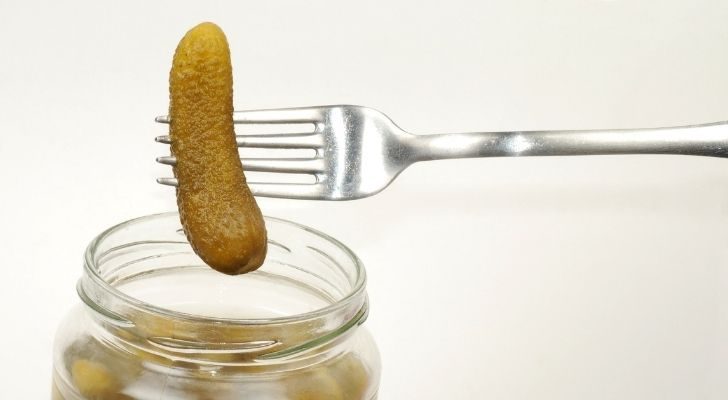 A piece of pickle on a fork