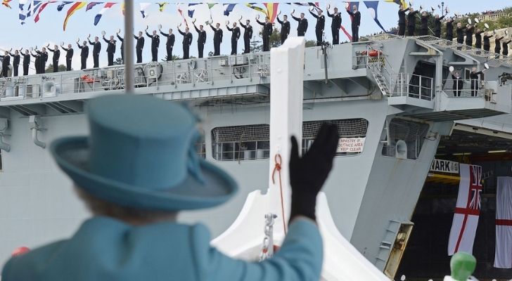 Queen Elizabeth II waving to the British Armed Forces
