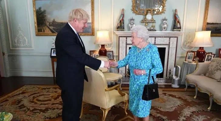 Queen Elizabeth II shaking hands with Prime Minister Boris Johnson