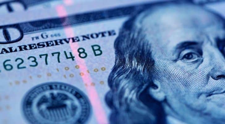 Security thread glowing on a $100 bill