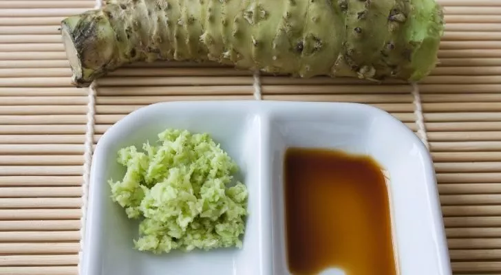 Freshly grated wasabi next to soy sauce.