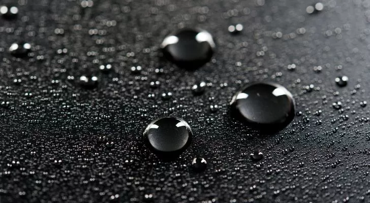 Water droplets on a black background.