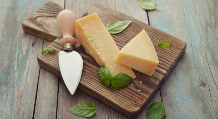 Two slices of parmesan with basil