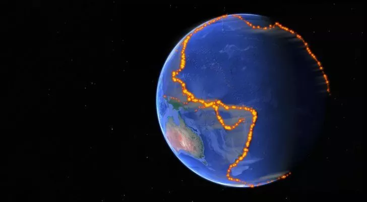 A picture of Earth from space with a red dotted line showing the Pacific Ring of Fire
