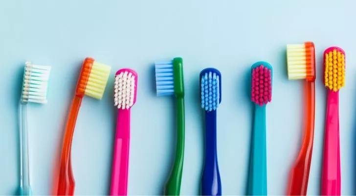 Lots of different colored toothbrushes