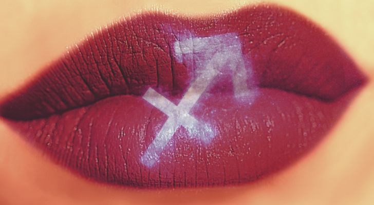 Sagittarius sign on someone's lips